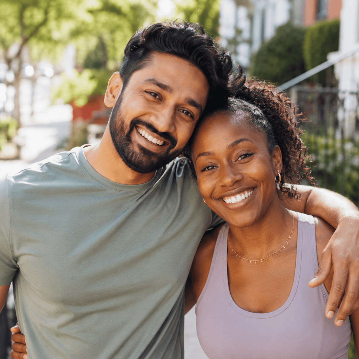 Therapist coaching a movement exercise outdoors
